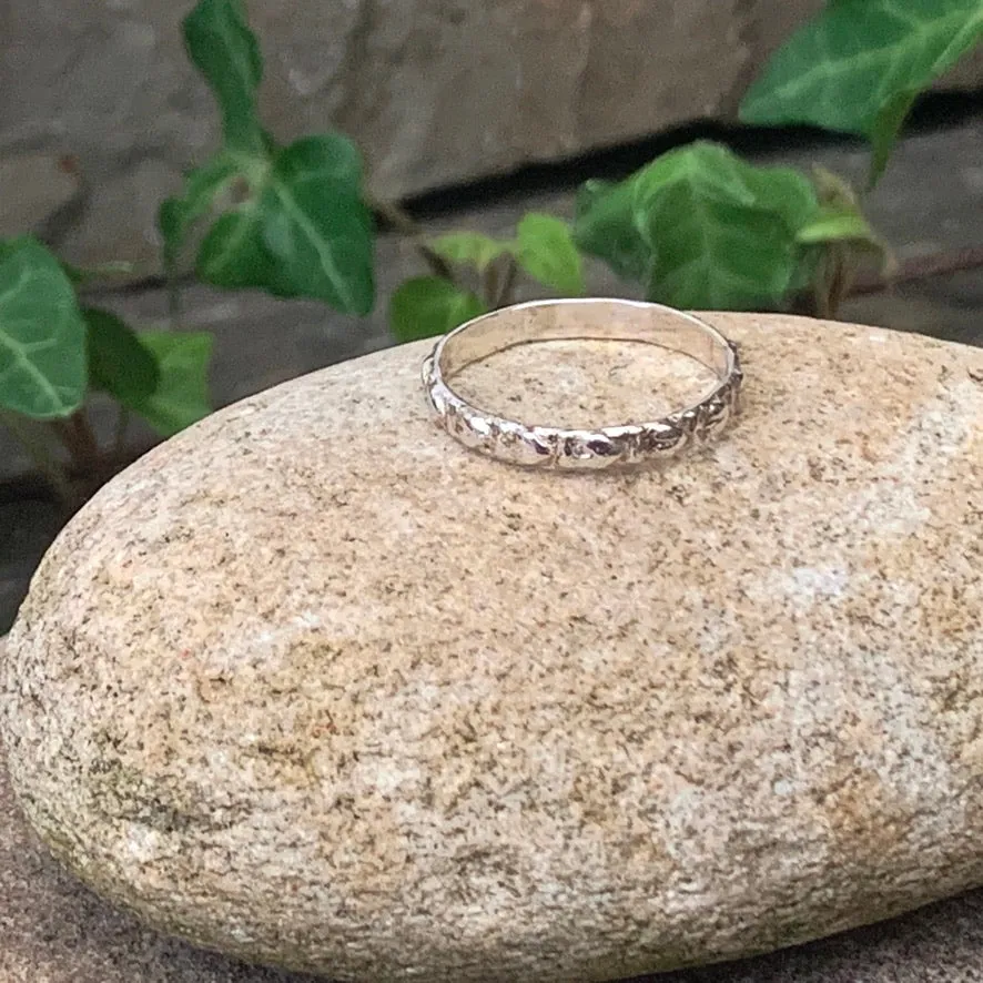 Textured, patterned, Sterling silver stacking rings.